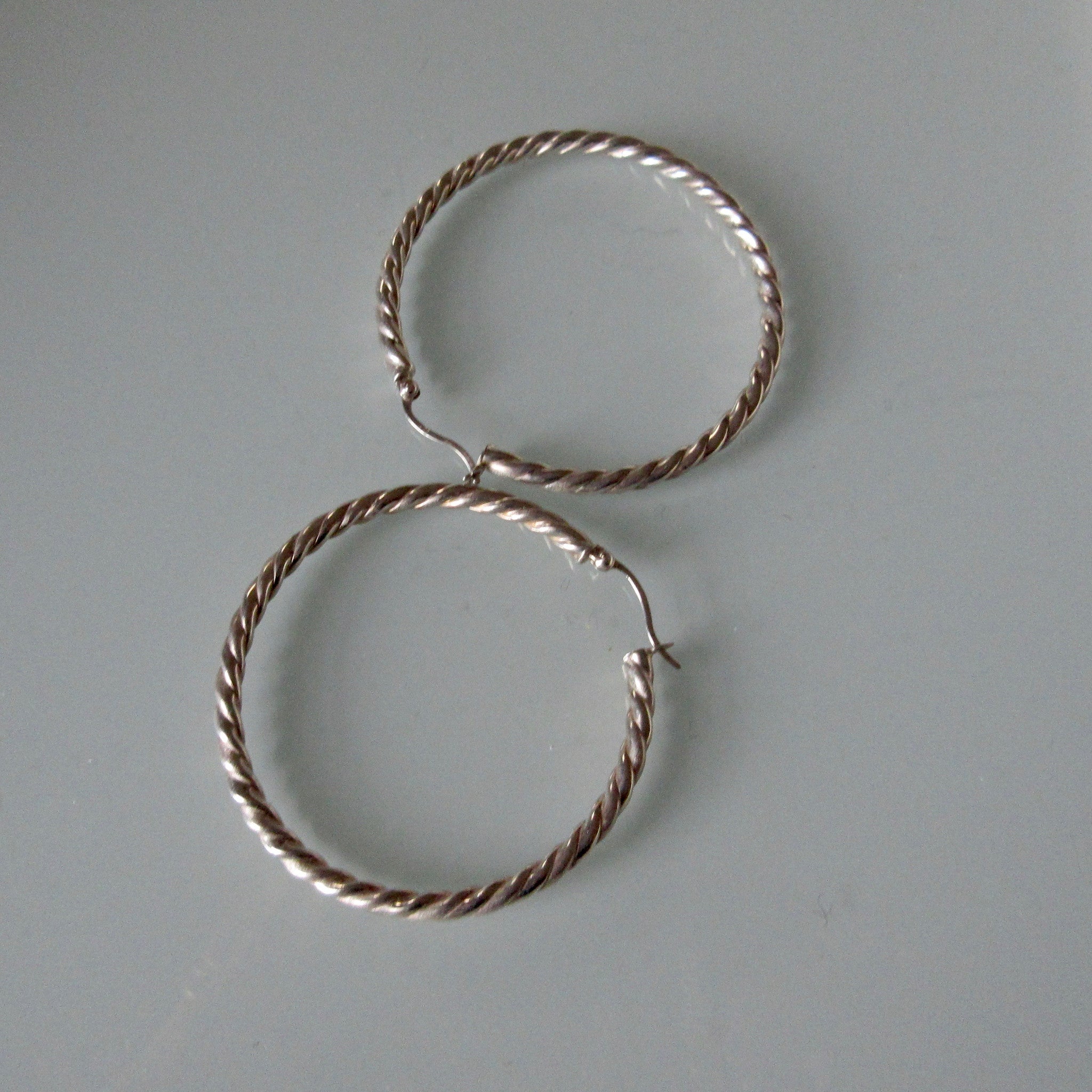 Contemporary Swirl Sterling Silver Hoop Earrings