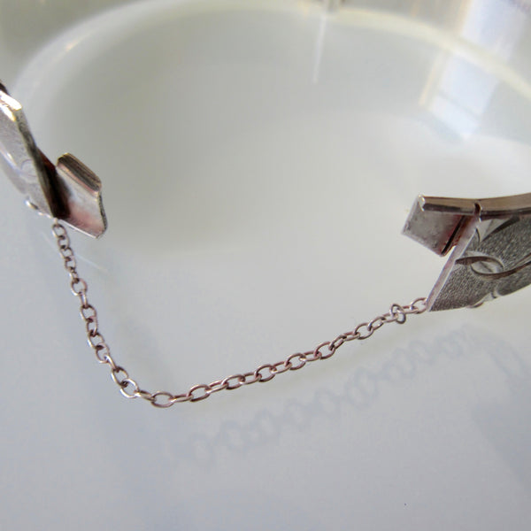 Monomil Ltd. sterling silver engraved cuff bangle 
